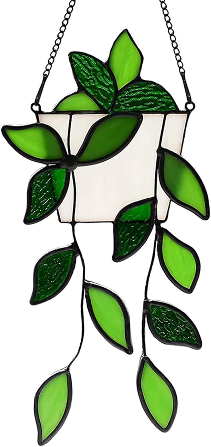 LittleVoleSherry green plant stained-glass sun catcher hanging in a sunny window for vibrant ambiance.