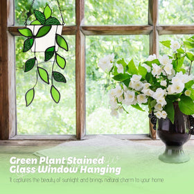 LittleVoleSherry green plant window art stained glass enhances natural light.