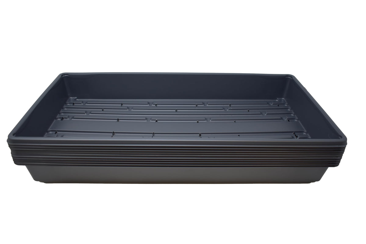 Living Whole Foods plant growing trays with drain holes for seed starting and indoor gardening, reusable
