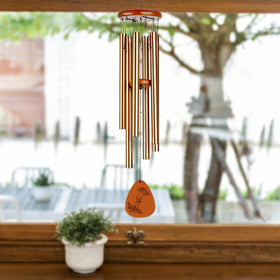Livinges front porch garden decor wind chime adds welcoming ambience.