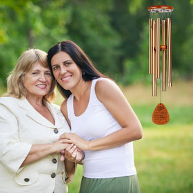 Livinges six gold-tubes wind chimes create soft soothing tones in any outdoor space.