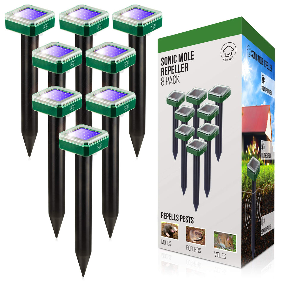 Livin' Well solar pest repeller stake in the yard providing burrow deterrence and yard protection