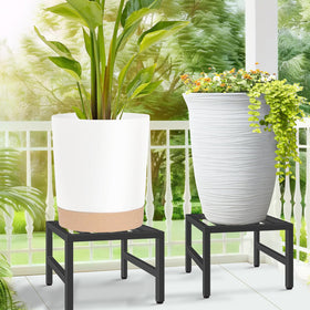 LLAXERGU minimalist black plant stand complements modern decor and greenery.