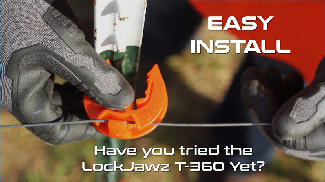 Orange LockJawz insulator protects wire contact points in outdoor setups