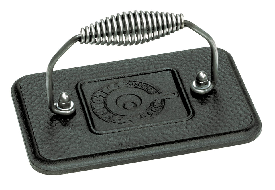 Lodge grill press with cool-grip handle for safe, even heating on stovetop or grill
