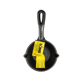 Lodge silicone basting brush close-up highlighting heat resistance up to 450°F
