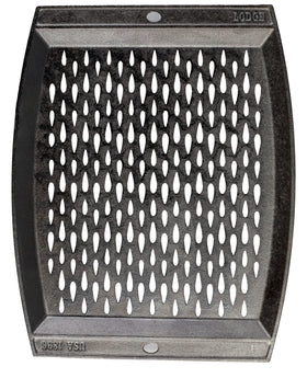 Lodge teardrop perforations close-up illustrating airflow for even grilling.