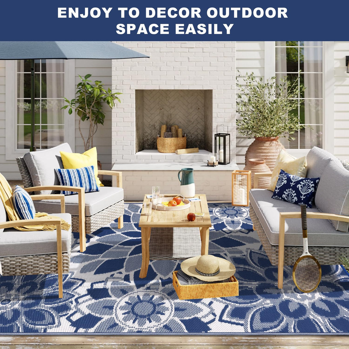 Lokhom navy-blue and white rug brightens outdoor living spaces.