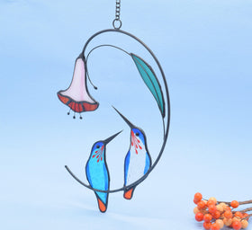 Lolitarcrafts hummingbird on branch with beads adds sparkle to any window.