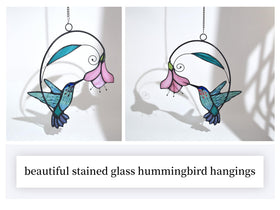 Lolitarcrafts stained glass hummingbird blue flower B window display in sun