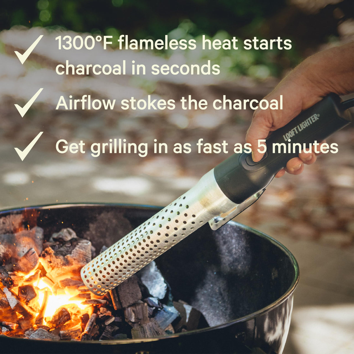 Looftlighter Classic in action ignites charcoal quickly without lighter fluid.