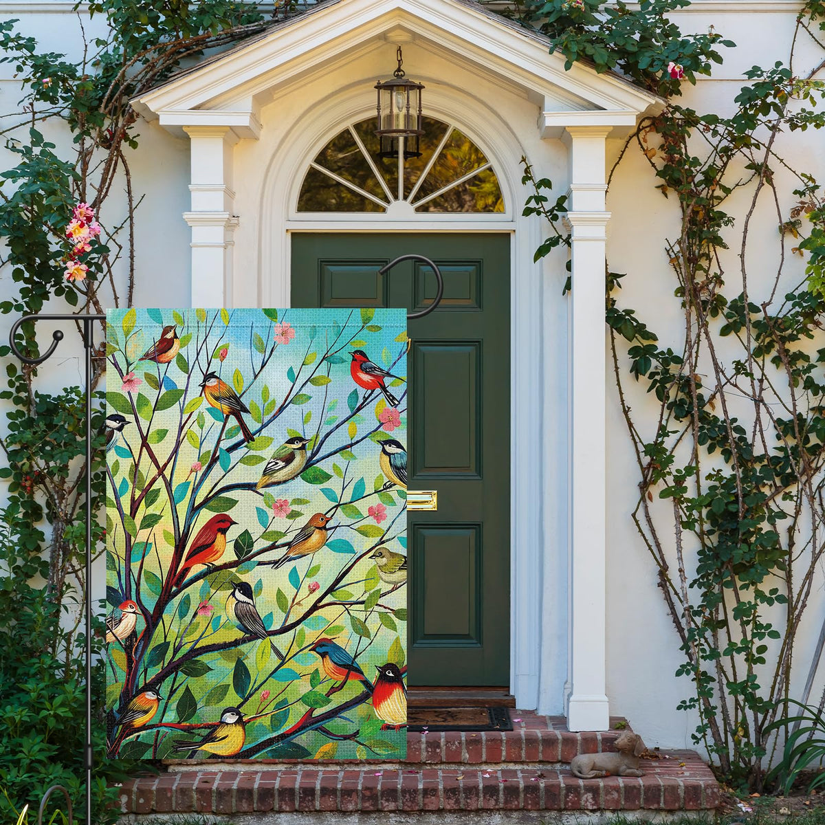 Louise Maelys bird-tree flag doubles-sided for consistent visibility.