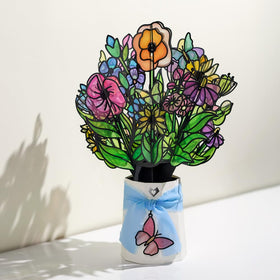 Blue chiffon ribbon enhances gifting and keeps the bouquet looking fresh