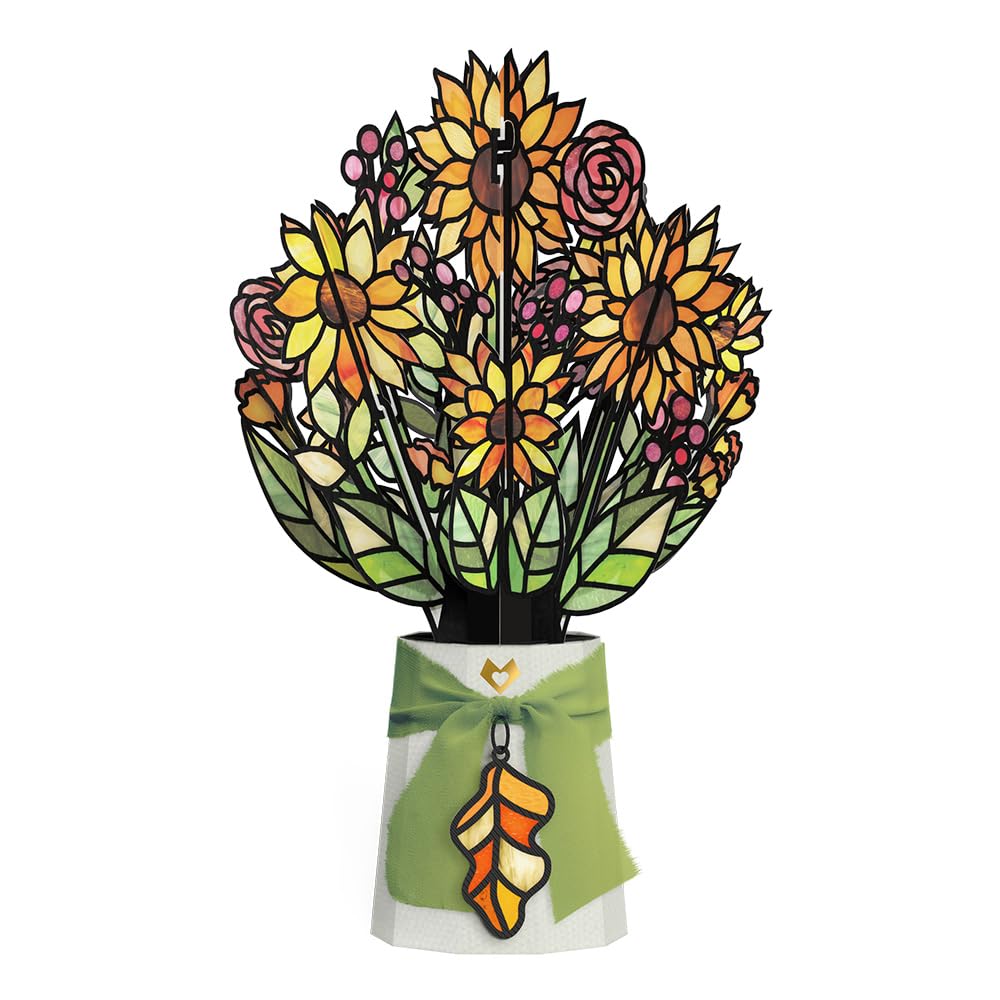 Lovepop golden-hour sunflower suncatcher 12in glows beautifully in natural light on a windowsill.