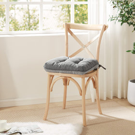 Love's cabin grey memory foam chair cushions on a modern kitchen chair.