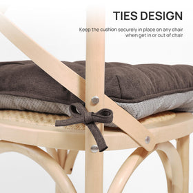 Love's Cabin memory foam chair cushions on a dining chair with ties fastened.
