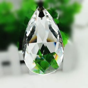 LoveUnited crystal suncatcher teardrop adds colorful light to sunlit rooms.