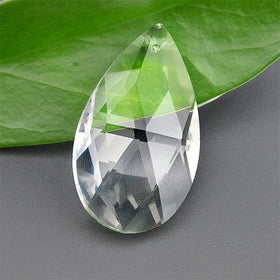 LoveUnited teardrop crystal pendants brighten baby rooms with rainbow glow.