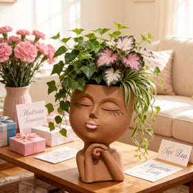 LovTocTic resin head planter suits air plants and small succulents