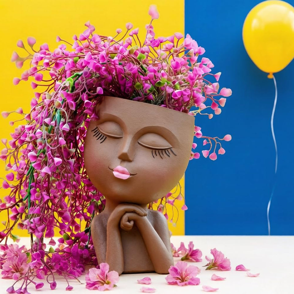 LovTocTic face planter in brown resin adds whimsical indoor decor