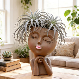 LovTocTic face planter with resin finish withstands outdoor weather