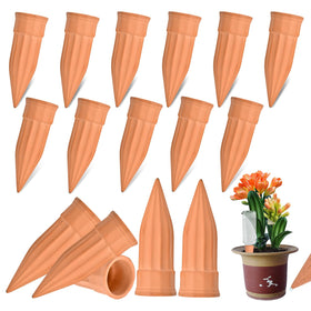 Lsed terracotta watering spike used with bottle setup for steady moisture