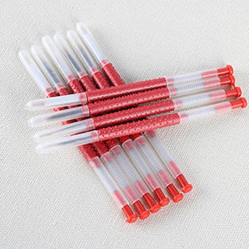 Red and white tool set is lightweight for field beekeeping sessions.