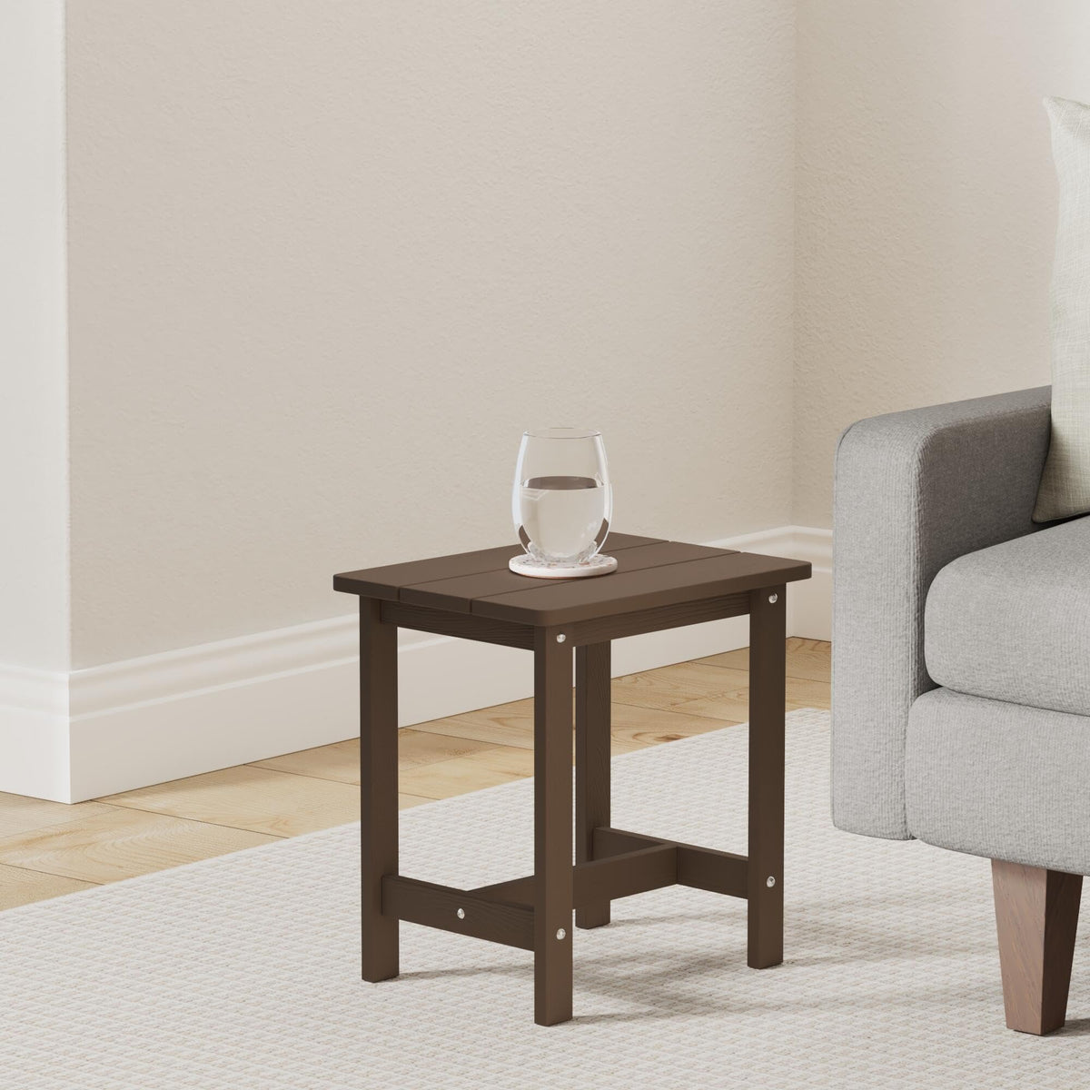 LUE BONA HDPS weather-resistant side table next to Adirondack chair