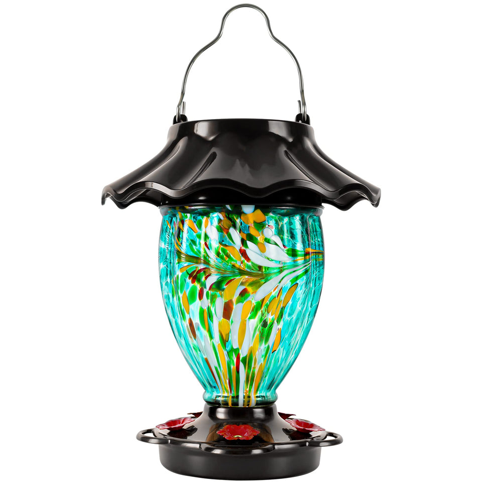 LUJII solar hummingbird feeder with teal glass reservoir, showcasing hand-blown artistry.