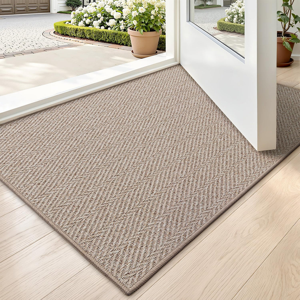 LUMI ultra-thin door mat at entrance; low profile, easy under-door fit