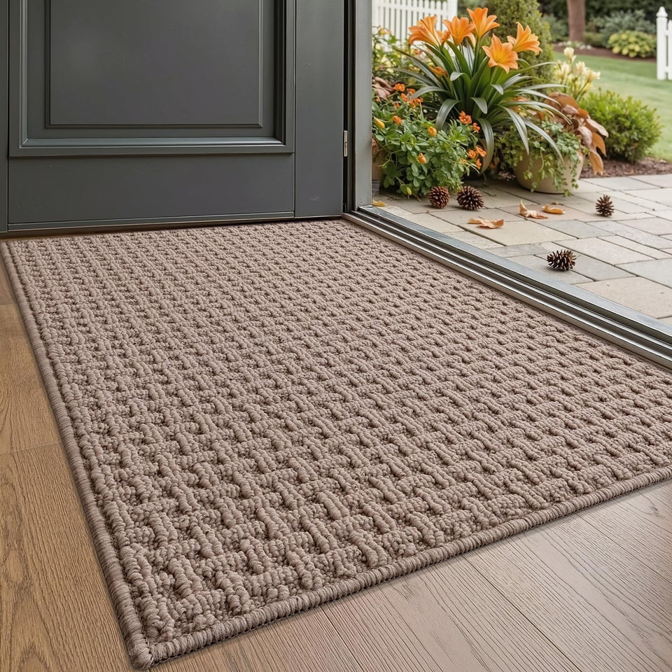 LUMI door mat with absorbent grid texture traps moisture at the doorway