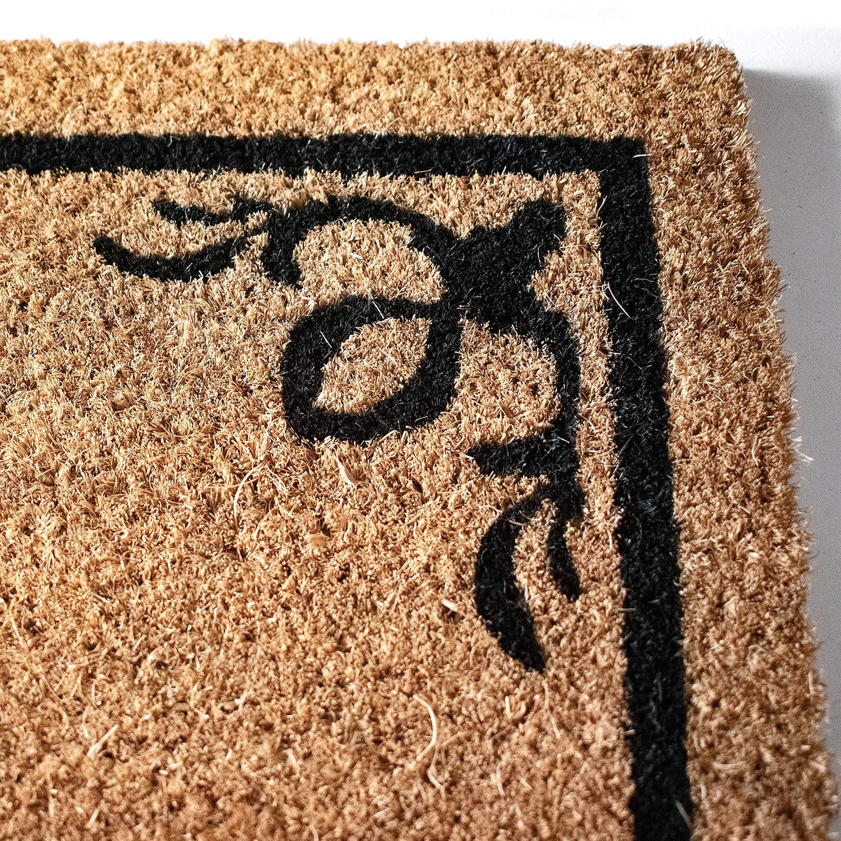 LuxUrux Coco Coir Welcome Mat measures 17x30 inches for standard doorways.