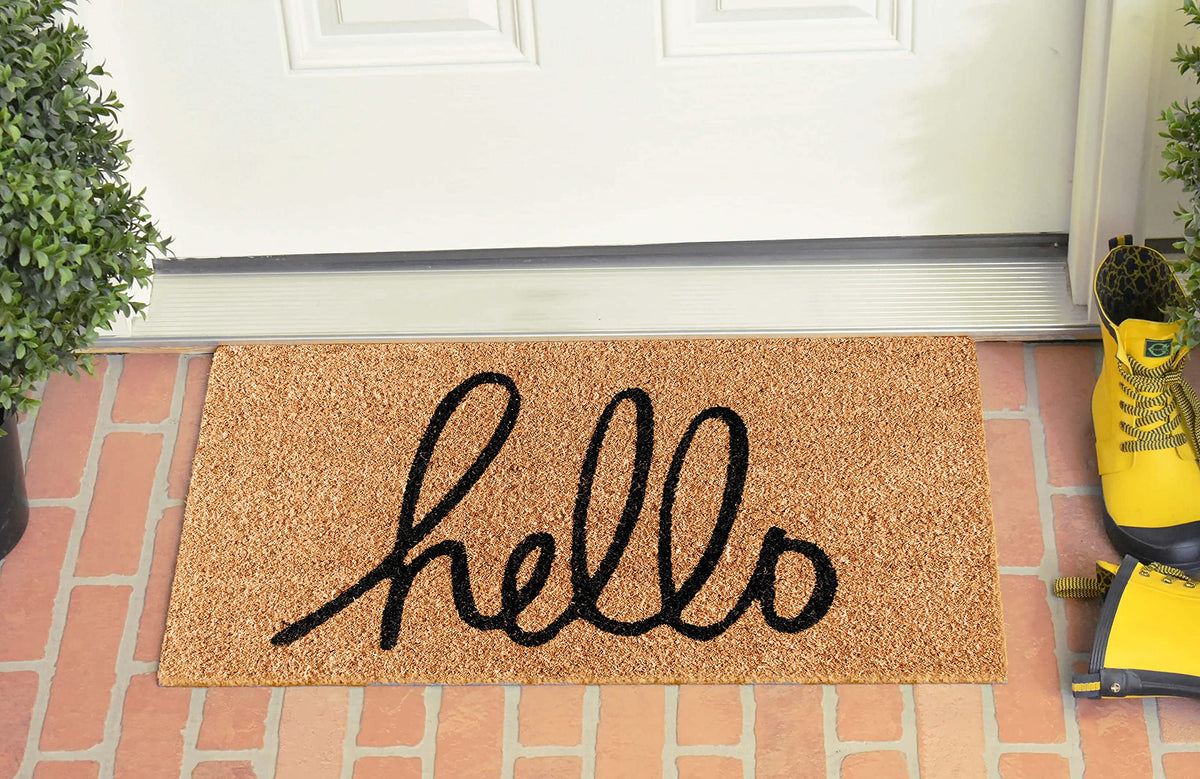 LuxUrux Hello doormat at an entryway setup emphasizing welcoming vibe