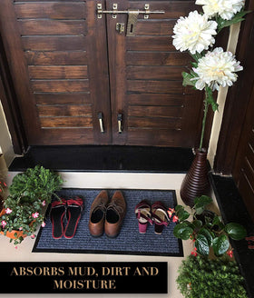 LuxUrux rubber beveled border helps block moisture and dirt at the doorway