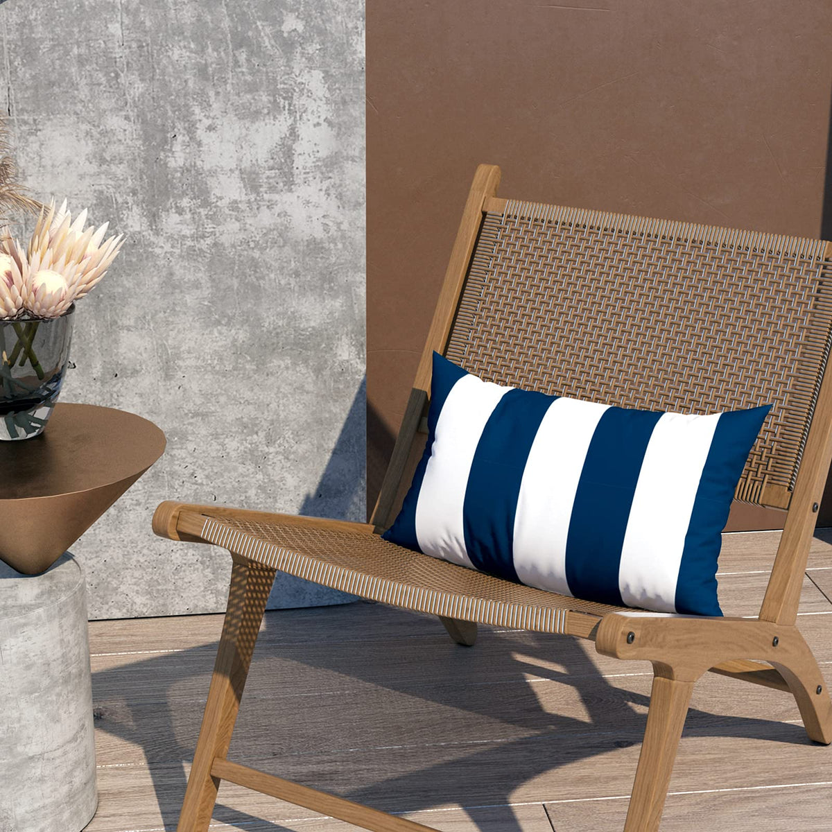 LVTXIII cabana navy decor complements garden furniture and poolside areas.