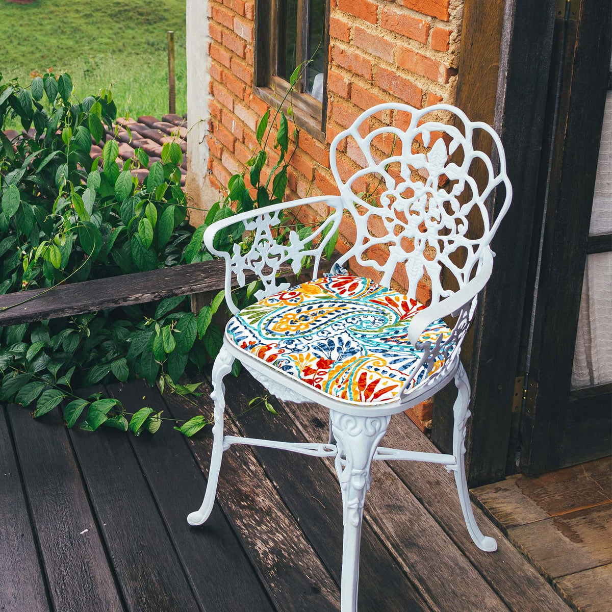 LVTXIII Cushion on patio chair in garden setting
