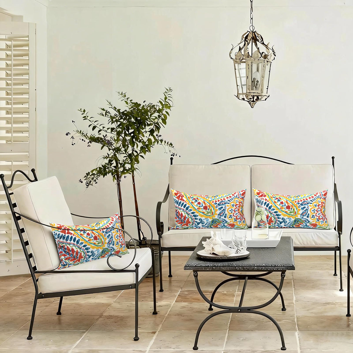 LVTXIII decorative pillow on a patio sofa adds inviting ambiance.