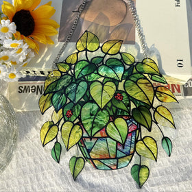 LXTMMRLJQ color spots project across walls when sunlight hits the suncatcher
