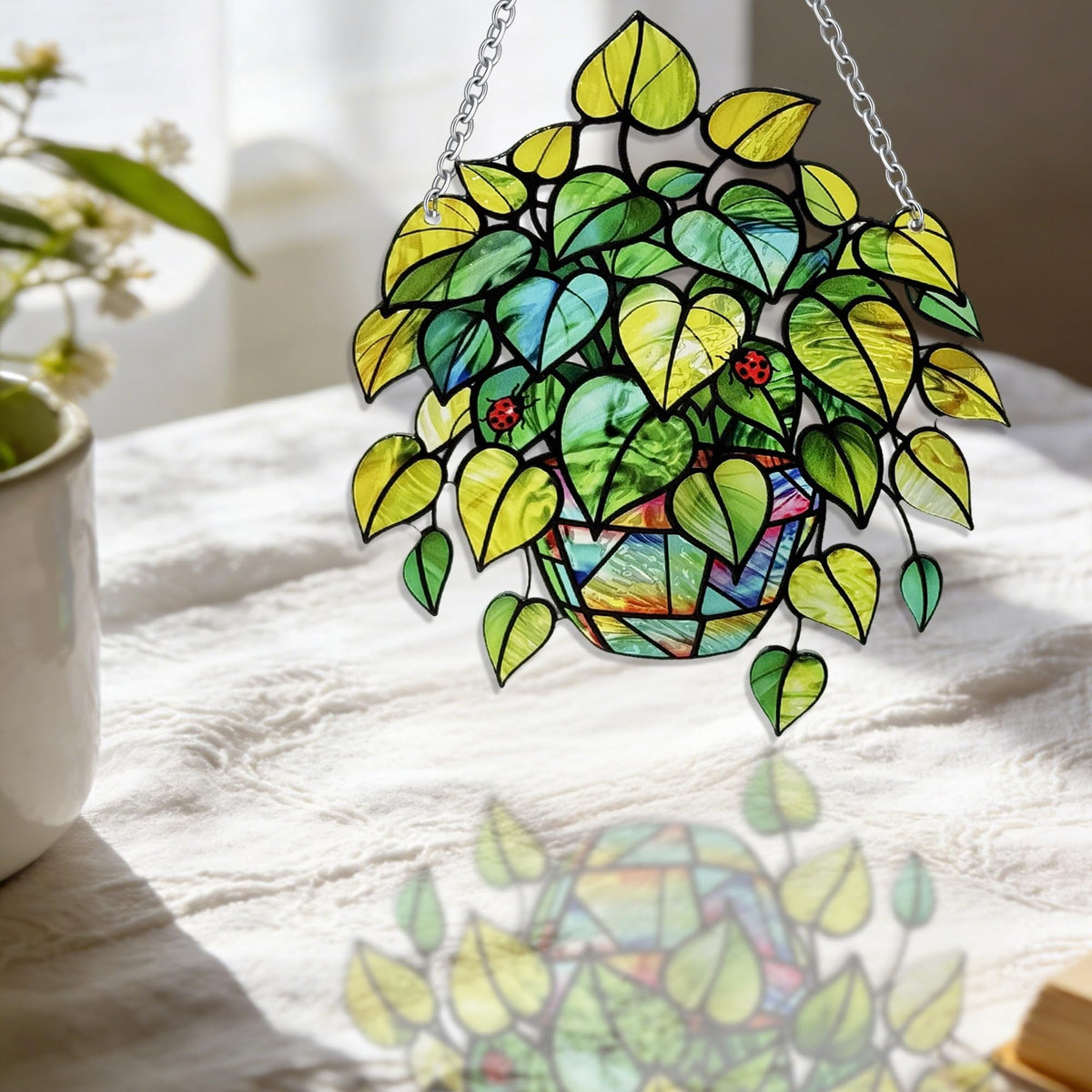LXTMMRLJQ UV-printed glass suncatcher with vivid leaf design
