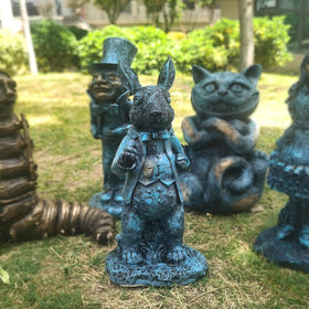 Lycss White Rabbit statue brightens patios with magical appeal.