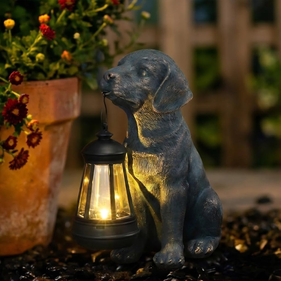 Lyeasw solar dog statue lantern glows softly at dusk in the garden.
