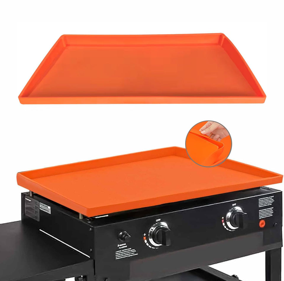 Lyonbi Blackstone silicone griddle mat on grill for stable cooking.