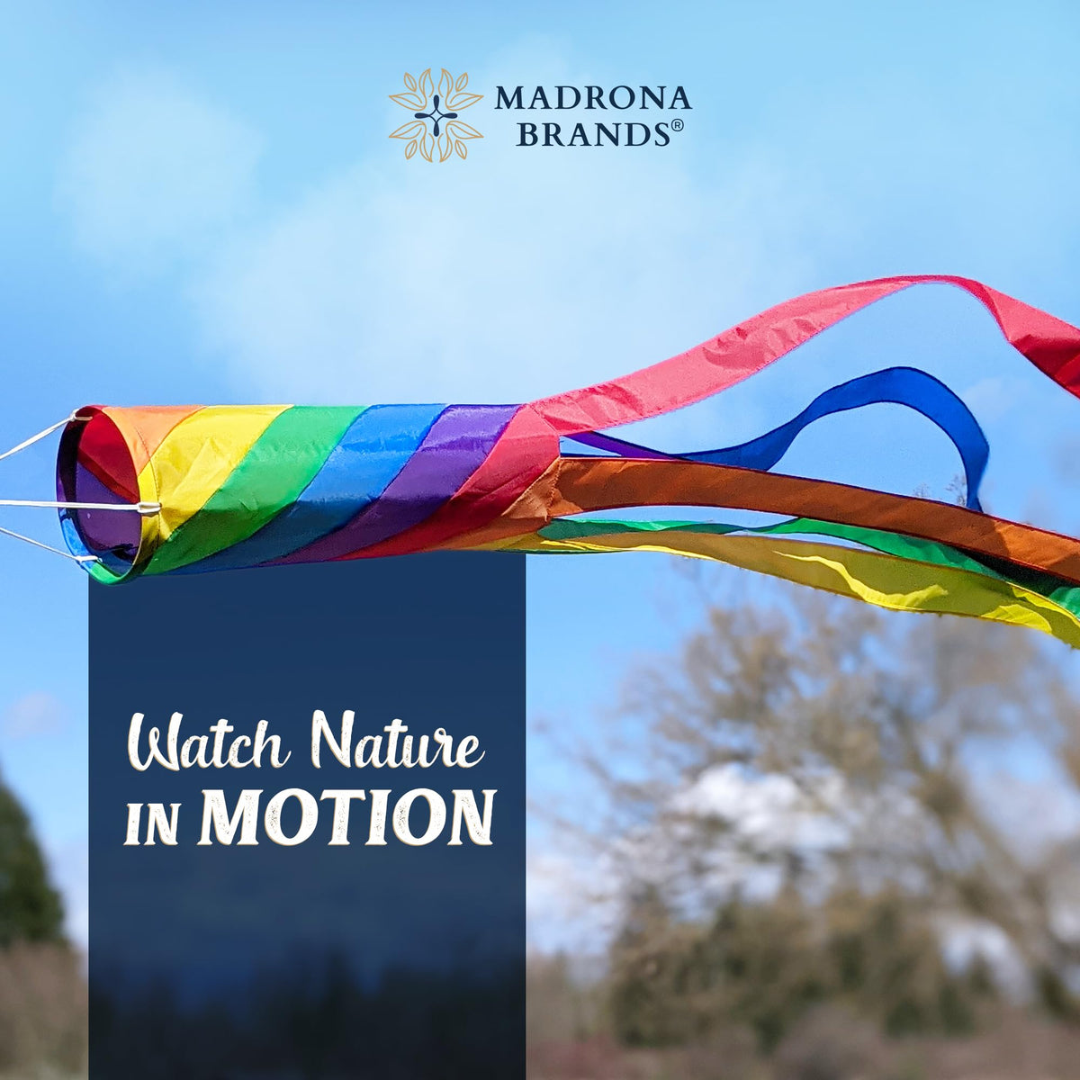 Madrona Brands Rainbow Stripe Windsock on a porch adds color and curb appeal.