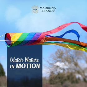 Madrona Brands Rainbow Stripe Windsock on a porch adds color and curb appeal.