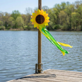 Garden entryway with Madrona Brands sunflower windsock in sunny scene