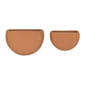 Main + Mesa half-moon stoneware wall planter with embossed hatch for stylish indoor display.