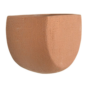 Main + Mesa close-up of textured hatch detail on stoneware planter.