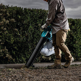 Makita XBU07Z removable wheels enable easy maneuvering on uneven ground.