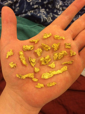 Mammoth Paydirt shows gold flakes and nuggets as exciting finds for weekend treasure hunting.