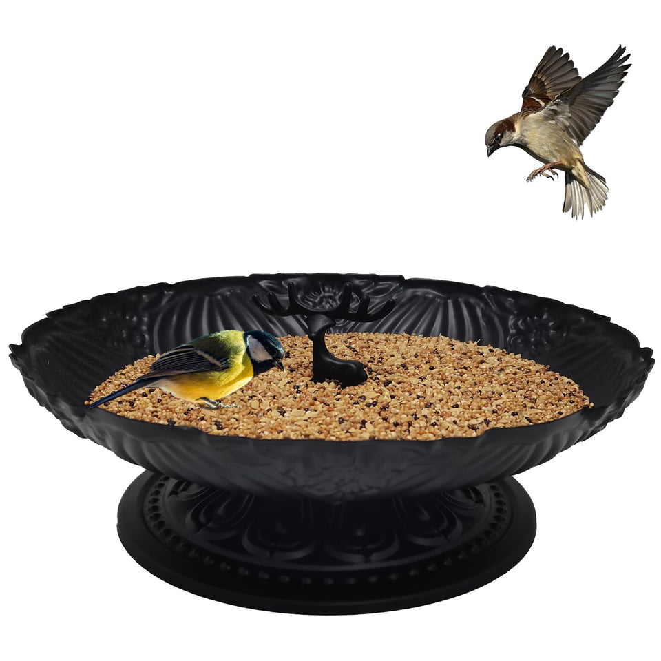 Manlikamu ground bird feeder 11-inch metal platform invites garden birds to feed.